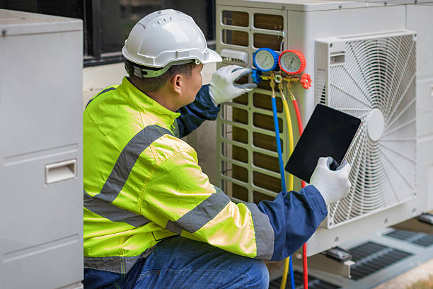 Professional Heat Pump Repair technician working in Pinecliffe, CO